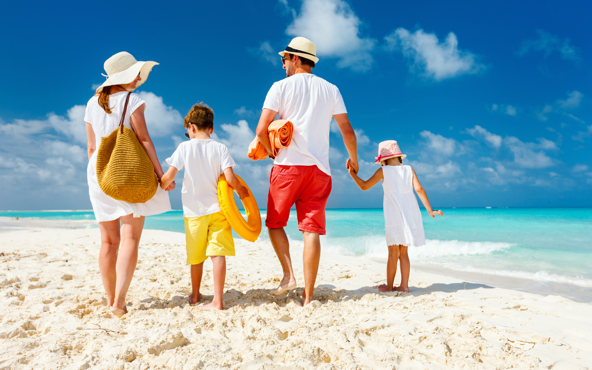 Family walking on the beach