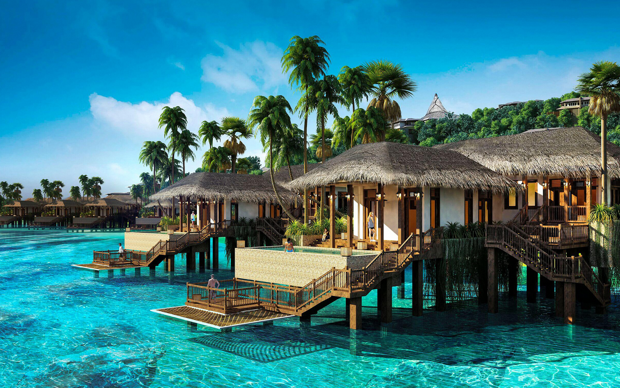 Overwater bungalows in tropical water
