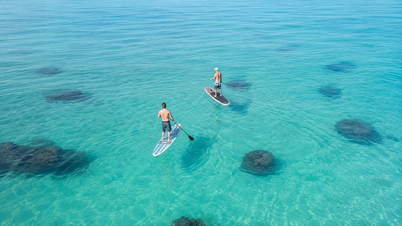 Paddle boarding off the beach in Destin Florida