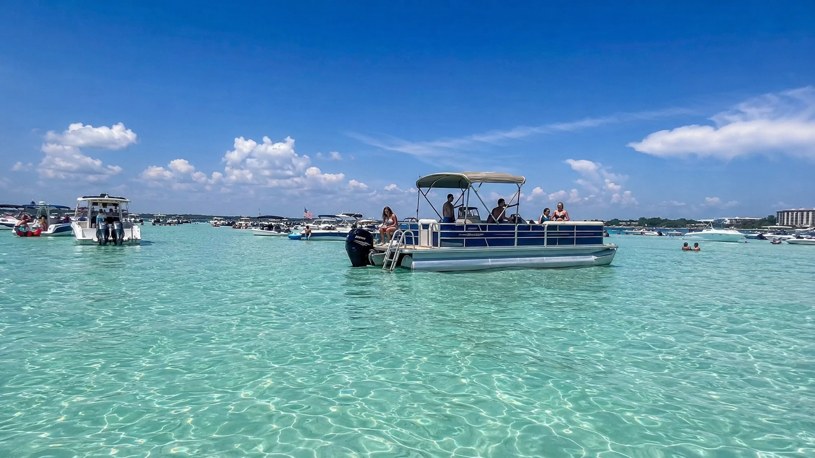 Family on a boat at crab island in destin florida