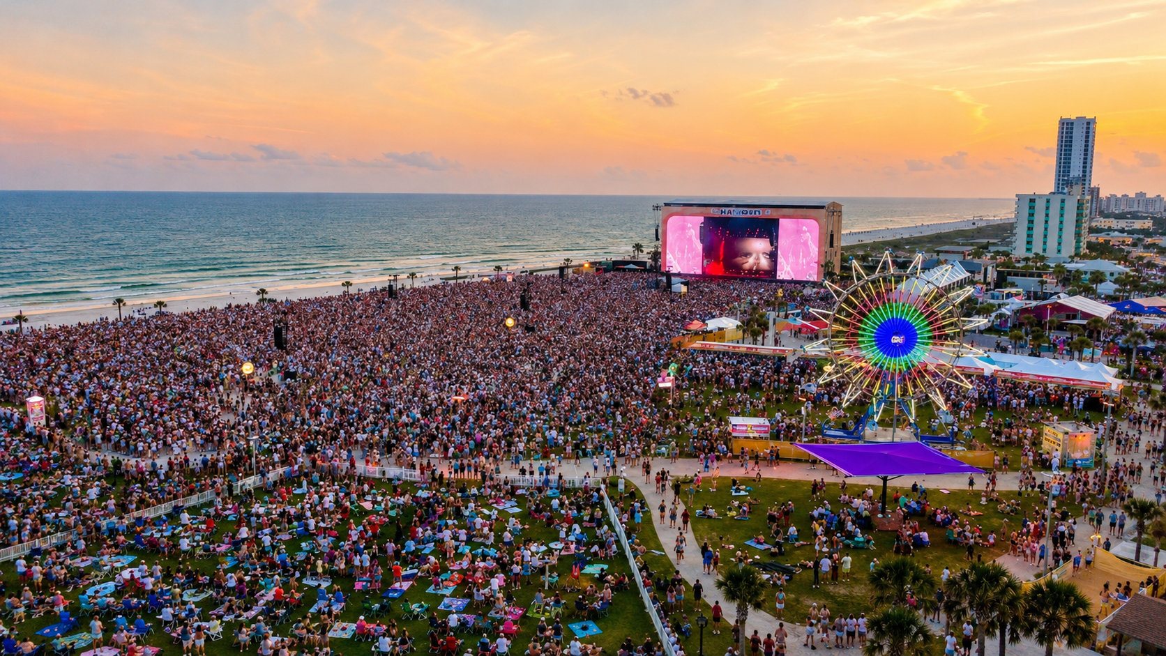 Crowded gulf shore beach during a concert