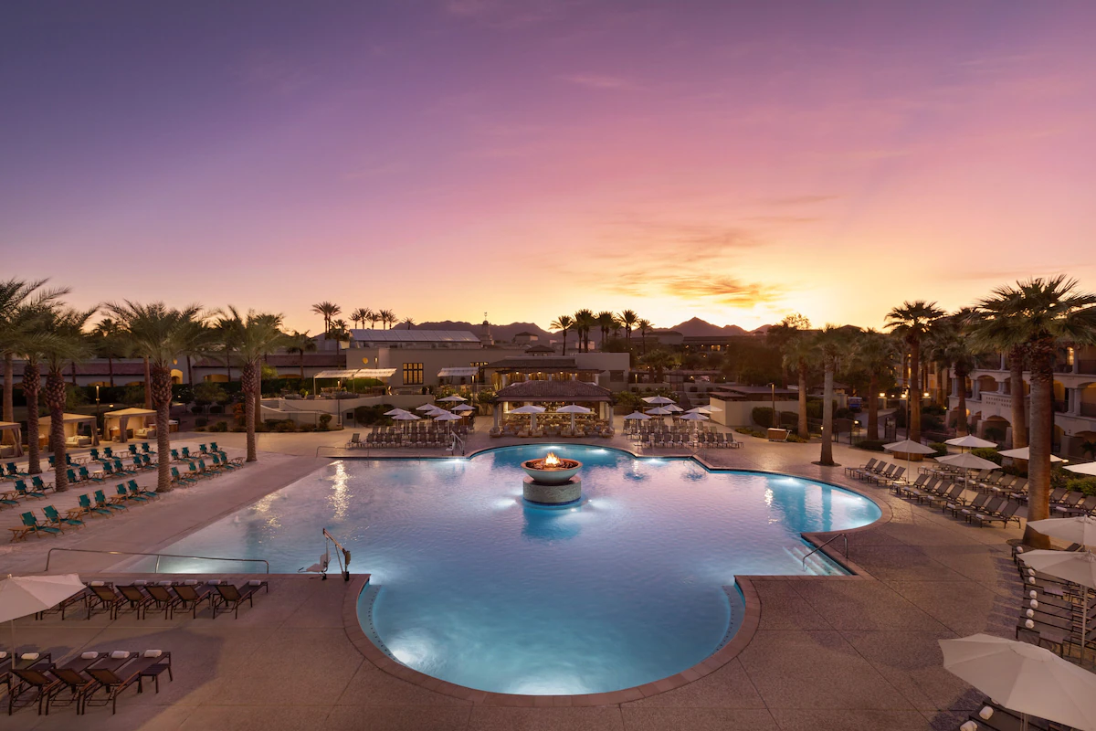 Resort pool at sunset