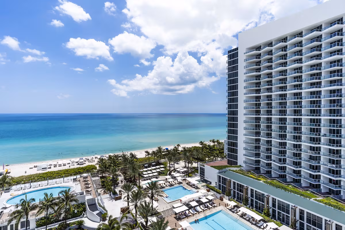 Enjoy the beach and the pool just steps away