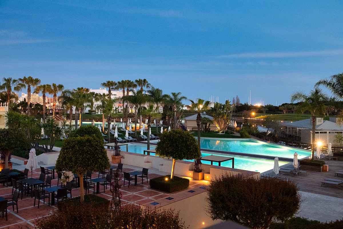 Resort pool at sunset