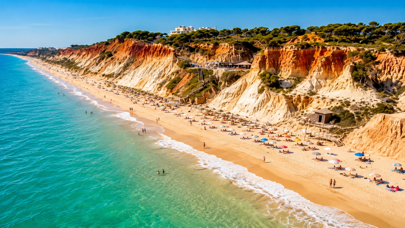 Relax under the red rocks of Praia da Falésia